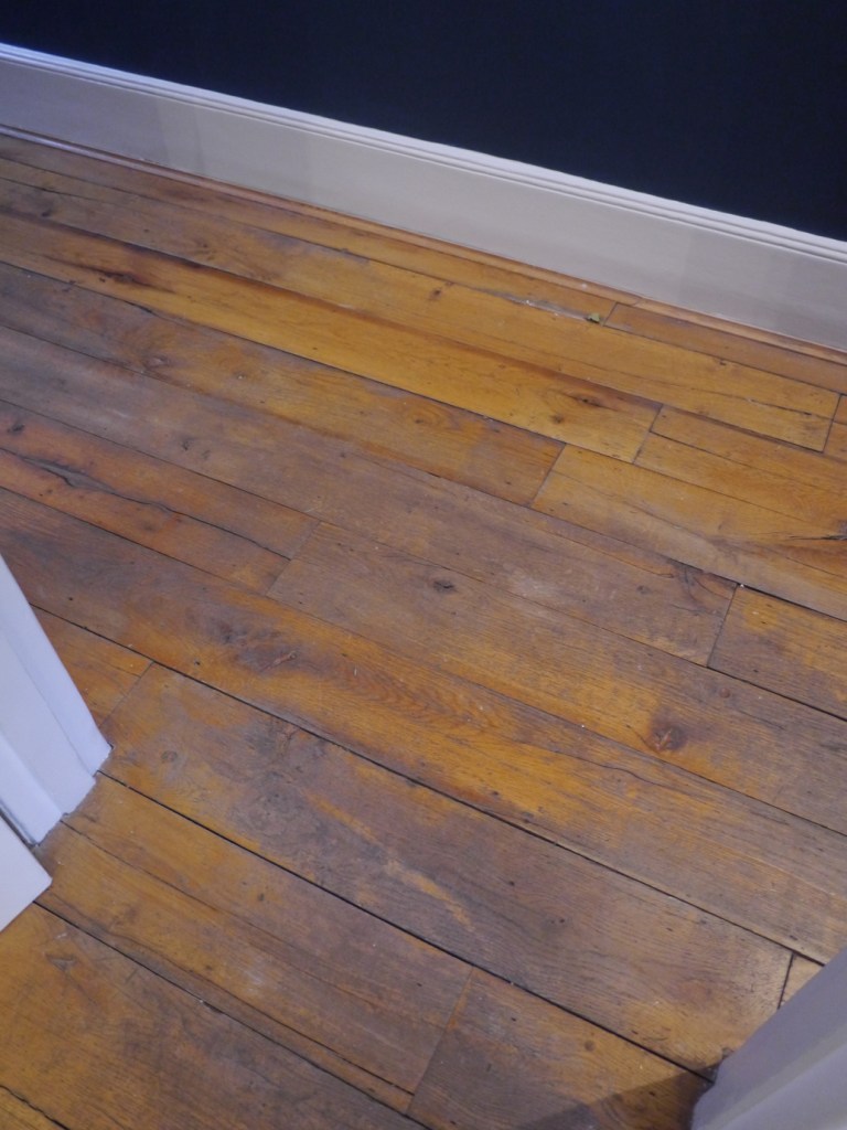 Sanding reclaimed oak board NEWELL FLOOR SANDING & WOOD RESTORATION